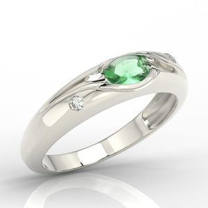 Pierścionek z białego złota ze szmaragdem i diamentami 0,03 ct wzór JP-57B