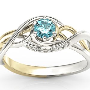 Pierścionek z białego i żółtego złota z topazem i brylantami BP-7130BZ