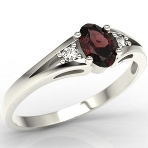 Pierścionek z białego złota JP-22B z granatem i diamentami 0,04 ct.