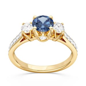 Pierścionek z żółtego złota z topazem London Blue i brylantami CP-31Z