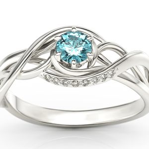 Pierścionek z białego złota z topazem i brylantami BP-7130B