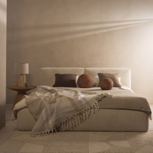 Łóżko tapicerowane 160x200 cm Sonno ze stelażem i pojemnikiem, kremowe, boucle